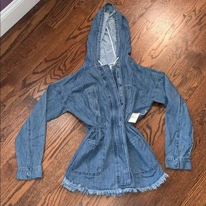 Stylish Jean jacket. Fringed bottom, cinched waist